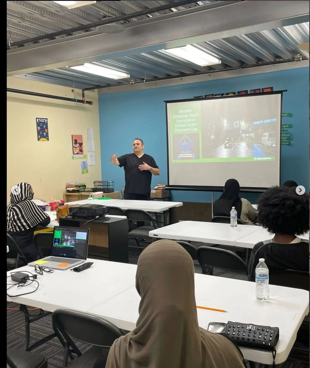 A dentist presenting at MAYF Dental Career Discovery Day